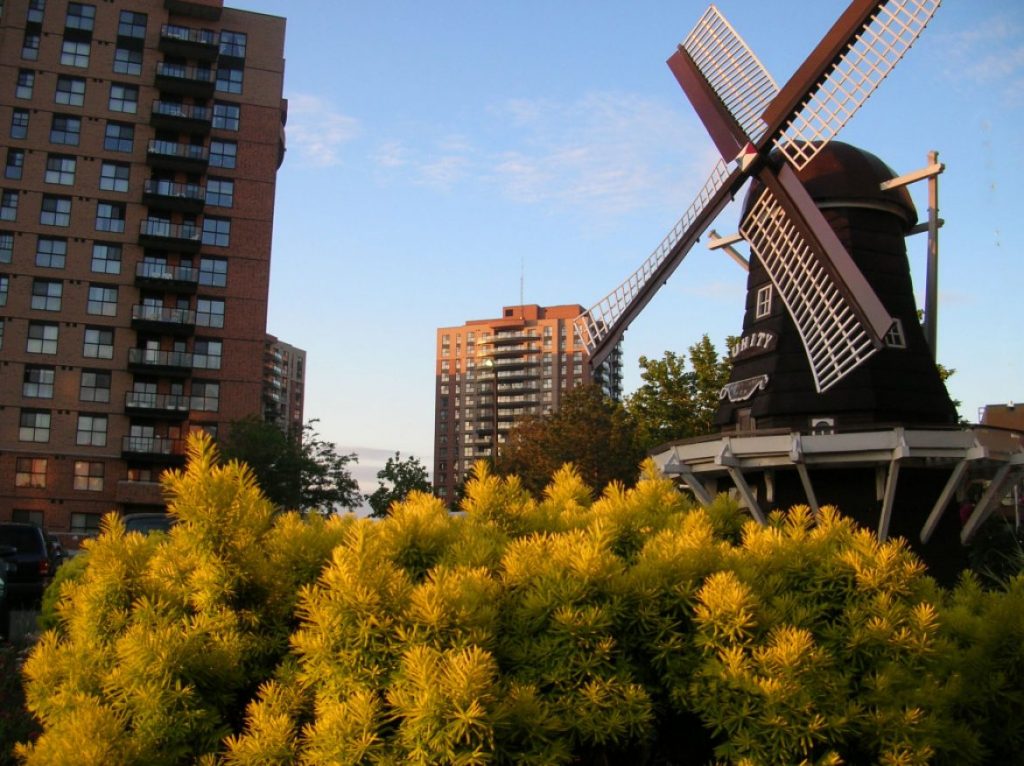 A picture of a windmill outside of Covenant Tower's main entrance.